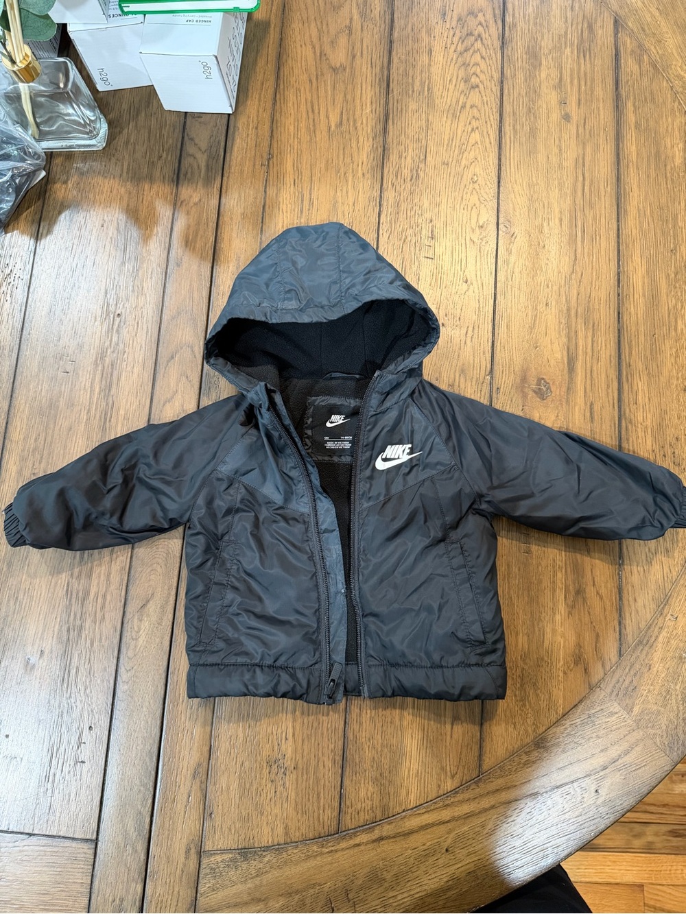 Nike Kids Hooded Puffer Jacket in Black with White Logo 12M